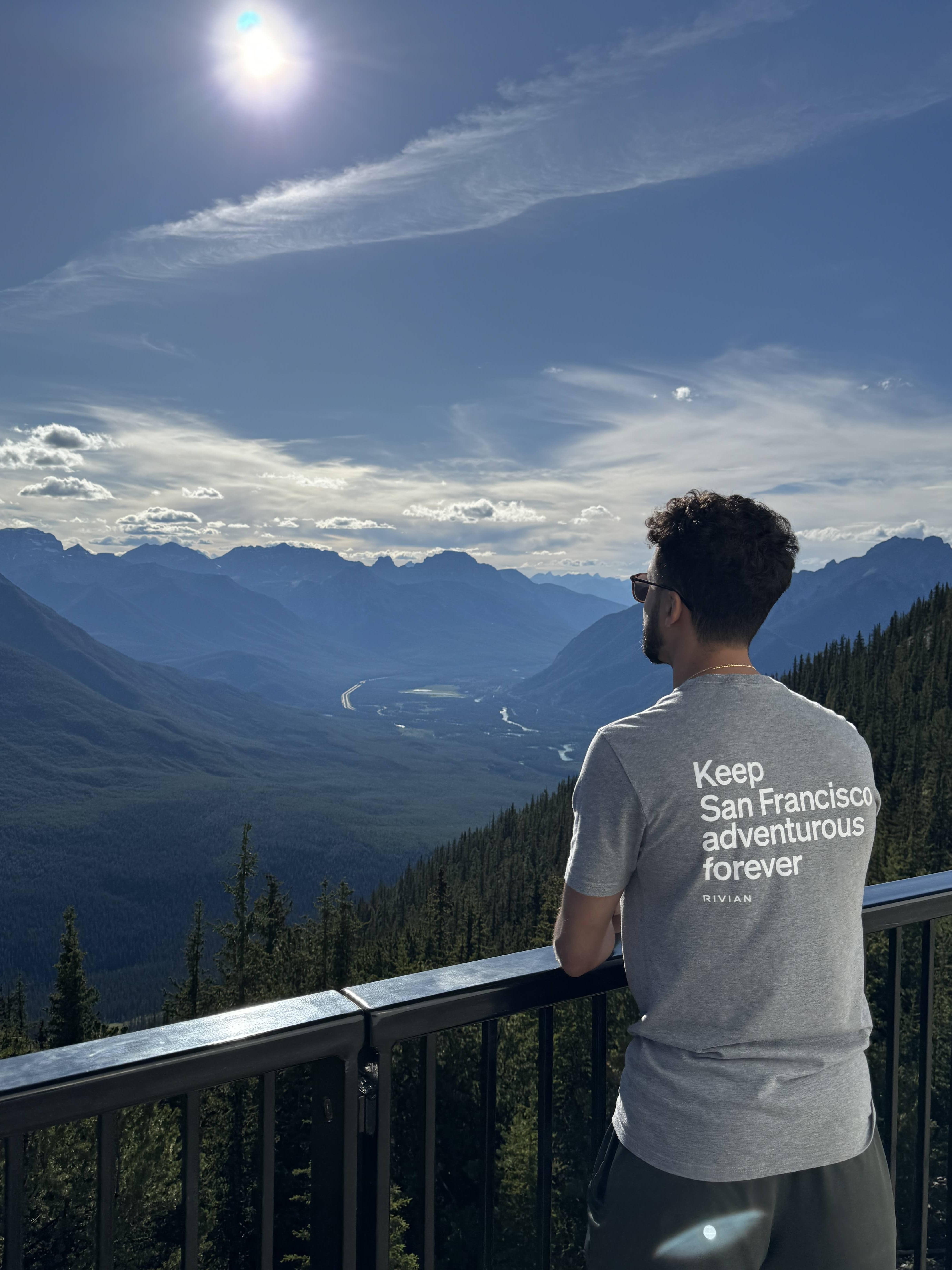 Andrew outdoors in the mountains